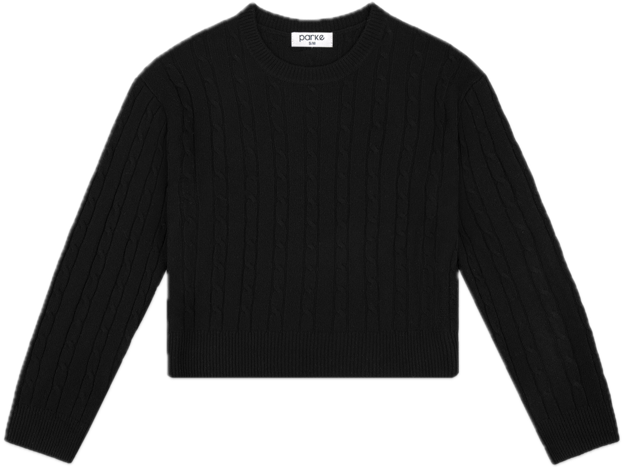 black cable knit sweater flat lay - black